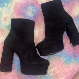 Black platform heel boots
